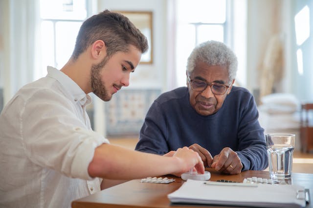 A resident sat with nurse