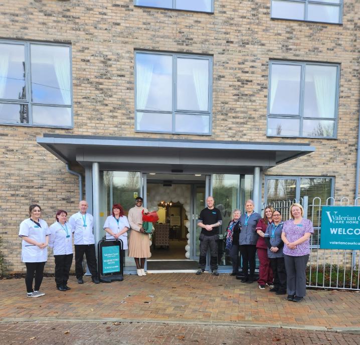 Team members outside the home on the first day.