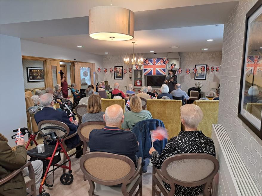 residents watching entertainment