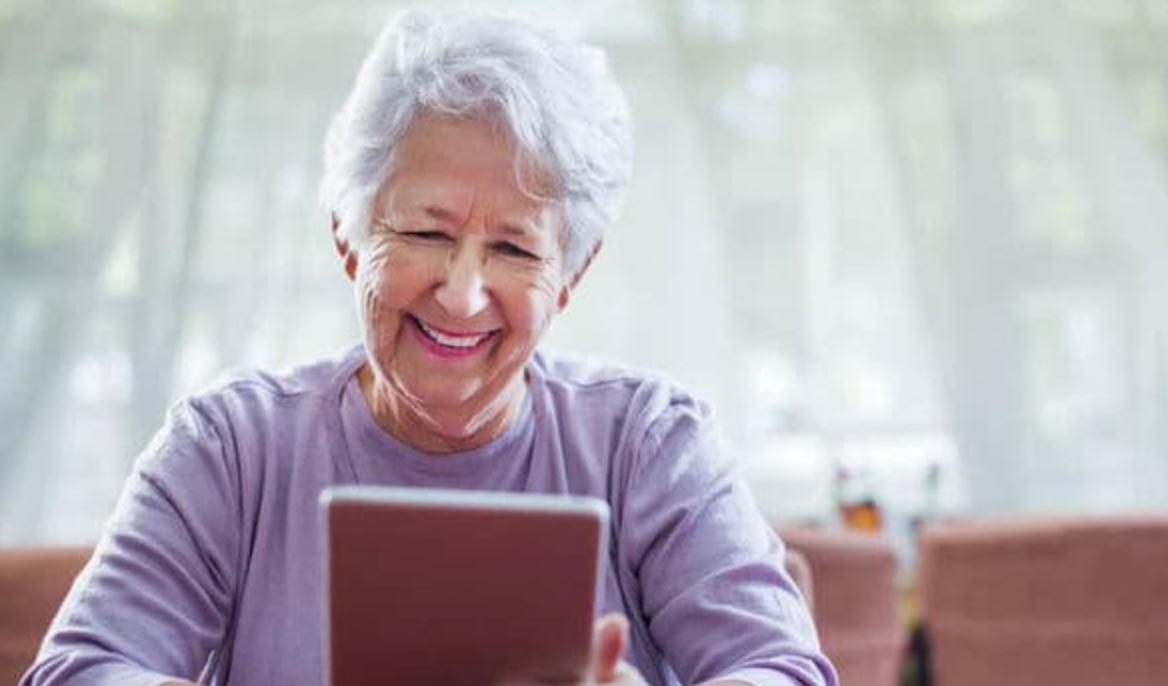 Resident looking at tablet