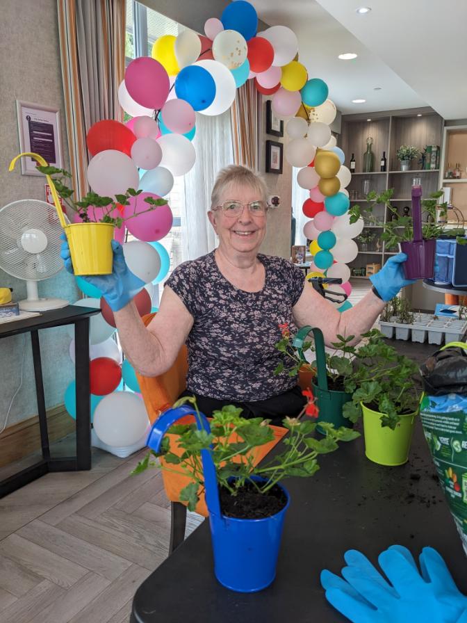 Resident enjoying gardening club