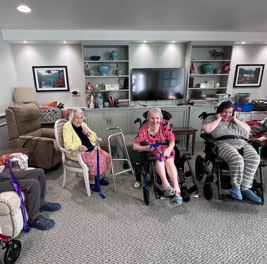 residents sat in armchairs together
