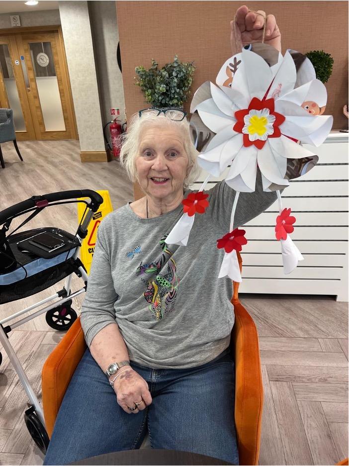 resident holding flower