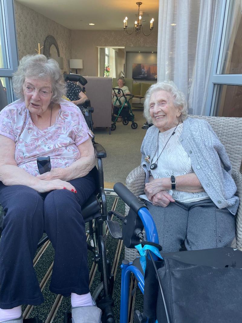residents in the garden together