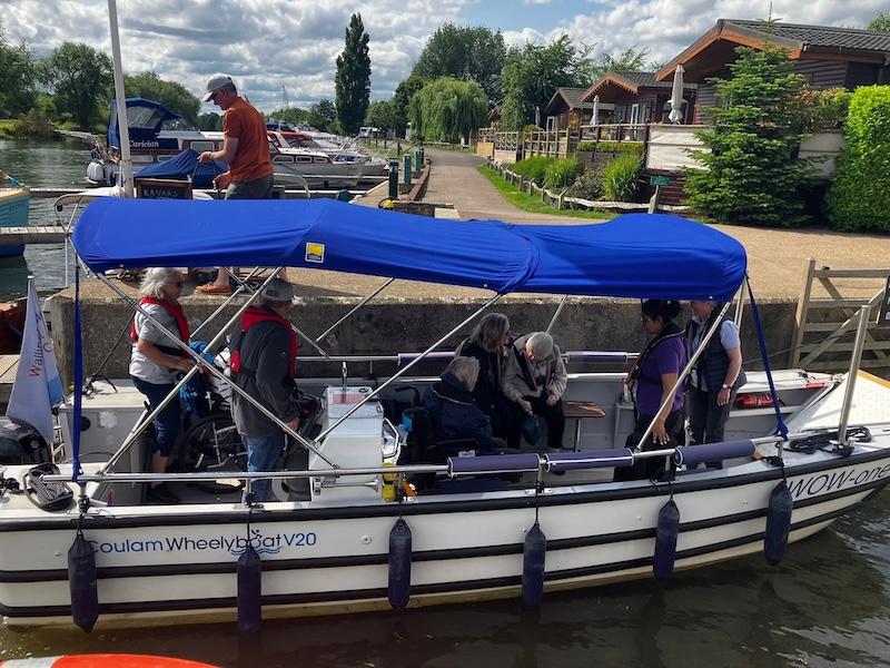 some of our residents and team on a boat