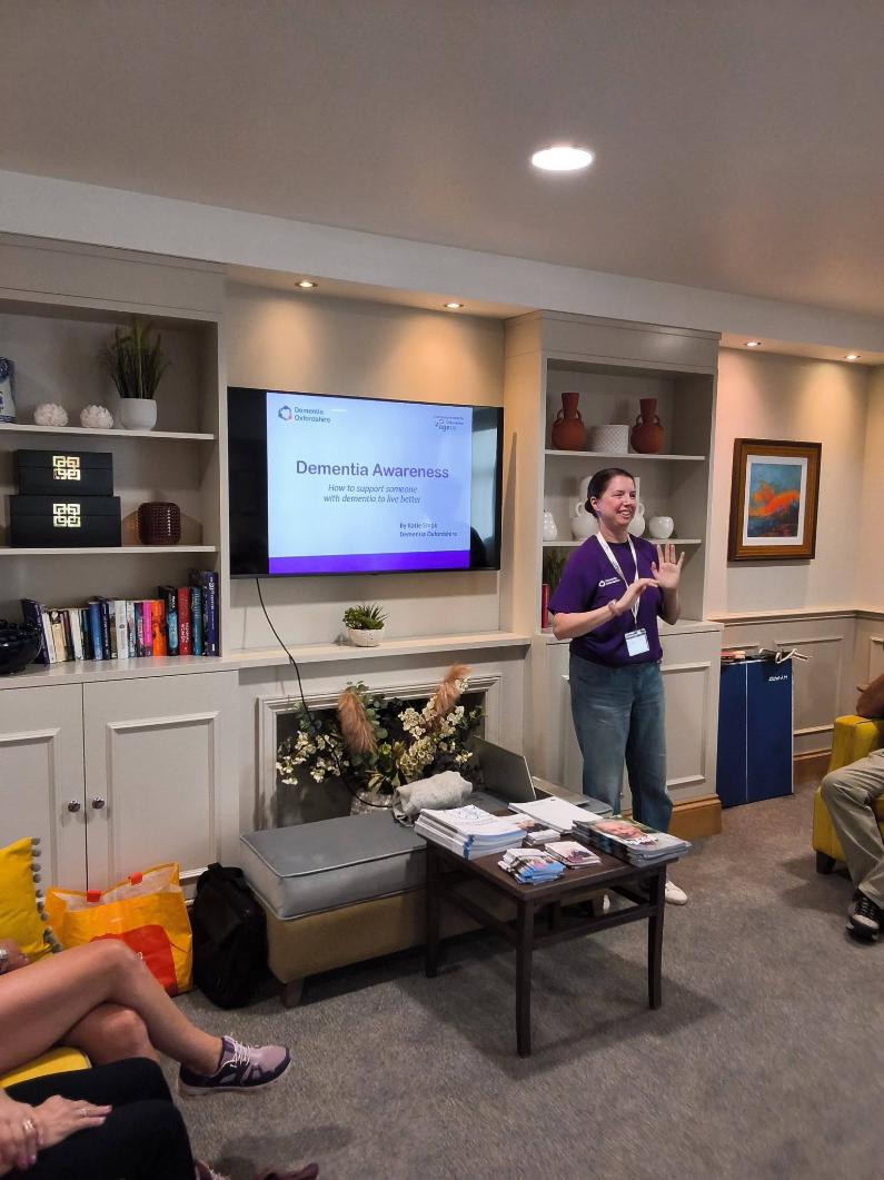 a lady giving a talk